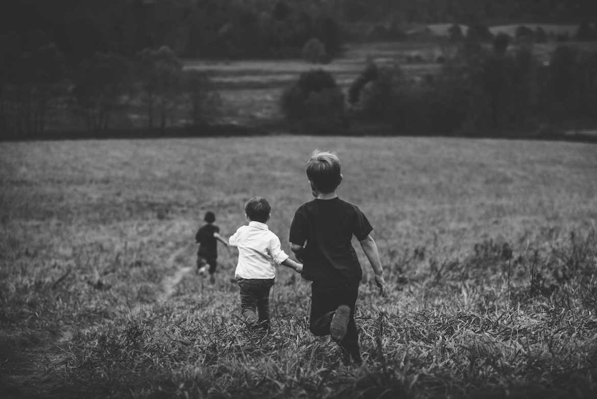 jordan-whitt-bw- children playing -unsplash